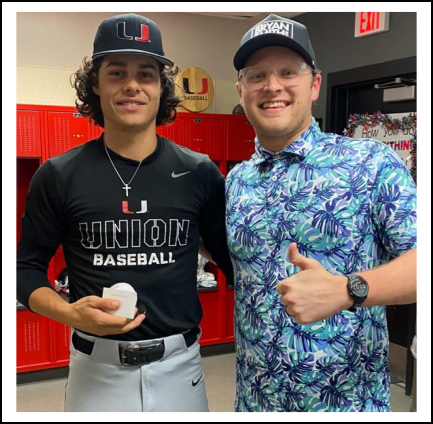 Player of the week sponsor presenting the player of the week recipient with a ball branded with the bank logo